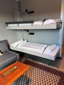 Postel nebo postele na pokoji v ubytování Hotell Älvdalen