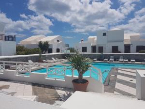 Swimmingpoolen hos eller tæt på Casa Sol y Playa + 10 billeder