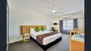 Uma cama ou camas num quarto em Pandanus