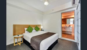 Uma cama ou camas num quarto em Pandanus