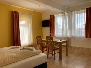 Ένα ή περισσότερα κρεβάτια σε δωμάτιο στο Landhotel Vosse-Schepers