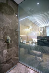 Koupelna v ubytování GK Regency Suites Hotel