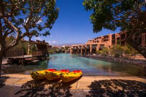 two kayaks sitting on the side of a river at Barceló Tenerife in San Miguel de Abona