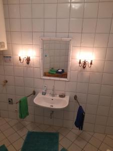 Łazienka w obiekcie Appartements Donaublick