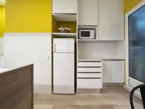 A kitchen or kitchenette at Stay U-nique Apartments Sants