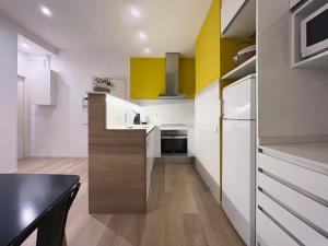 A kitchen or kitchenette at Stay U-nique Apartments Sants
