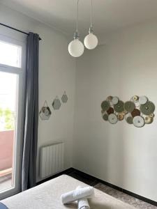 Posteľ alebo postele v izbe v ubytovaní Le triomphe logement central, 8 pax 3 chambres