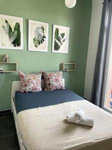 Posteľ alebo postele v izbe v ubytovaní Le triomphe logement central, 8 pax 3 chambres