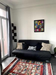 Posedenie v ubytovaní Le triomphe logement central, 8 pax 3 chambres