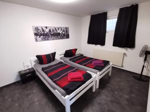 Postel nebo postele na pokoji v ubytování B3c Dornbirn Hills