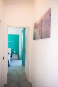 A bed or beds in a room at Lough appartamento
