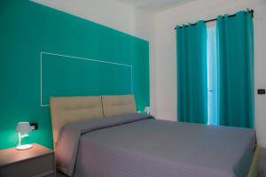 A bed or beds in a room at Lough appartamento