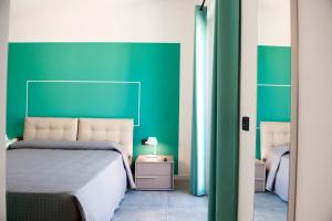 A bed or beds in a room at Lough appartamento