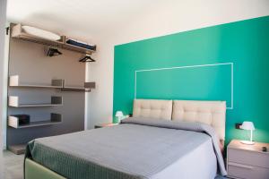 A bed or beds in a room at Lough appartamento