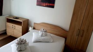 Postel nebo postele na pokoji v ubytování Casa Nicholas