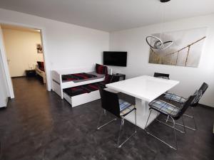 TV a/nebo společenská místnost v ubytování B3c Dornbirn Hills + 3 fotografie