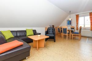 Χώρος καθιστικού στο Ferienwohnung Juist Inselhaus am Deich