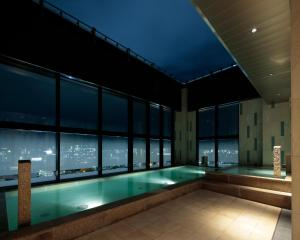 Candeo Hotels Kumamoto Shinshigai游泳池或附近泳池