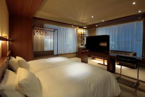 Candeo Hotels Kumamoto Shinshigai電視和／或娛樂中心