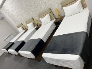 TASHRIF HOTEL客房内的一张或多张床位