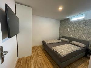 Ένα ή περισσότερα κρεβάτια σε δωμάτιο στο Bungalow am Donaupark