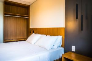 Postel nebo postele na pokoji v ubytování Salinas Premium Resort