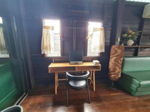 Posezení v ubytování Non House Bangkok บ้านนอนโฮสเทล
