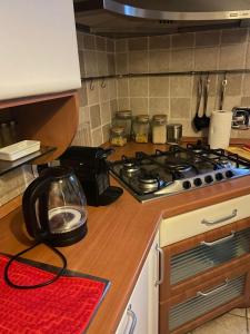 A kitchen or kitchenette at OB1 Vacanze Romane