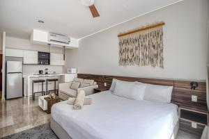 Kuchyň nebo kuchyňský kout v ubytování Mya Residence 206 at Aldea Zama