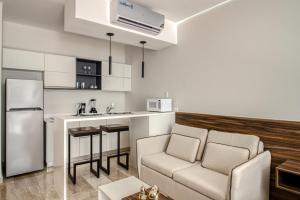 Kuchyň nebo kuchyňský kout v ubytování Mya Residence 206 at Aldea Zama