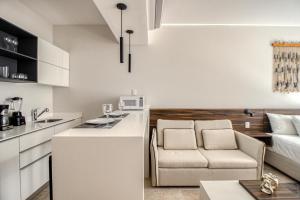 Kuchyň nebo kuchyňský kout v ubytování Mya Residence 206 at Aldea Zama