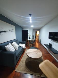 a living room with a couch and a table at LOCADOR Nueva Cordoba 3C in Cordoba