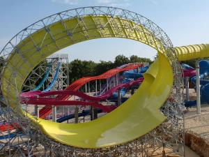 a roller coaster with a slide at a water park at Villa in Funtana with private Tenniscourt (3418) in Funtana