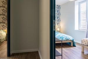 Letto o letti in una camera di Le Pigalle