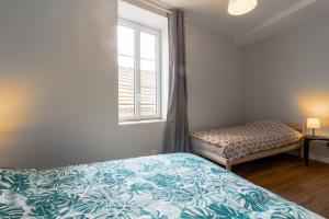 Letto o letti in una camera di Le Pigalle