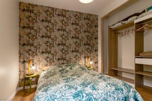 Letto o letti in una camera di Le Pigalle
