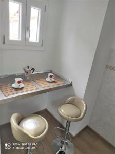 Fotografie z fotogalerie ubytování ATTICO RUCELLAI CON TERRAZZA SUPER VISTA ve Florencii + 26 fotografií