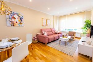 A seating area at APARTAMENTOS RIAMAR 2