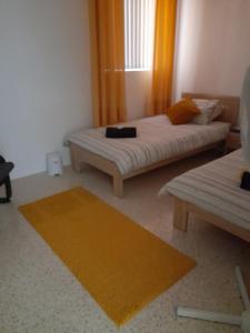 Letto o letti in una camera di Gozo Marsalforn