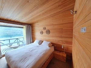 Postel nebo postele na pokoji v ubytování Hotel & Café Bauda