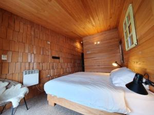 Postel nebo postele na pokoji v ubytování Hotel & Café Bauda