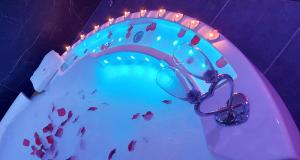 a childrens water slide in a party with lights at L'OLYMPE DES SENS in Portiragnes