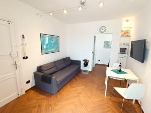 Televízia a/alebo spoločenská miestnosť v ubytovaní Good Vibes Apartment