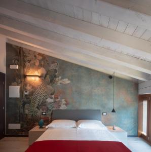 Postel nebo postele na pokoji v ubytování Monte Isola - Decio Rooms