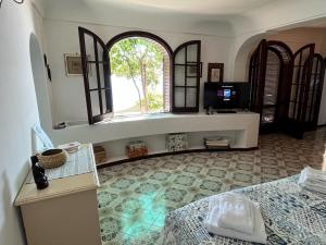 Ένα ή περισσότερα κρεβάτια σε δωμάτιο στο Casa Reverie - Amalfi Coast +29 φωτογραφίες