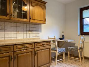 Kuchyň nebo kuchyňský kout v ubytování Ferienwohnung Am Weißfrauenbach