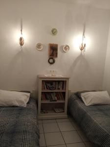 Postel nebo postele na pokoji v ubytování Giaglakis Rooms