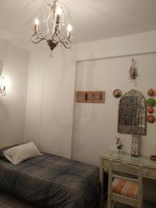 Postel nebo postele na pokoji v ubytování Giaglakis Rooms