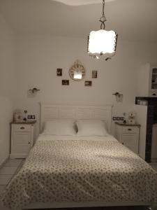 Postel nebo postele na pokoji v ubytování Giaglakis Rooms