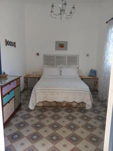 Postel nebo postele na pokoji v ubytování Giaglakis Rooms